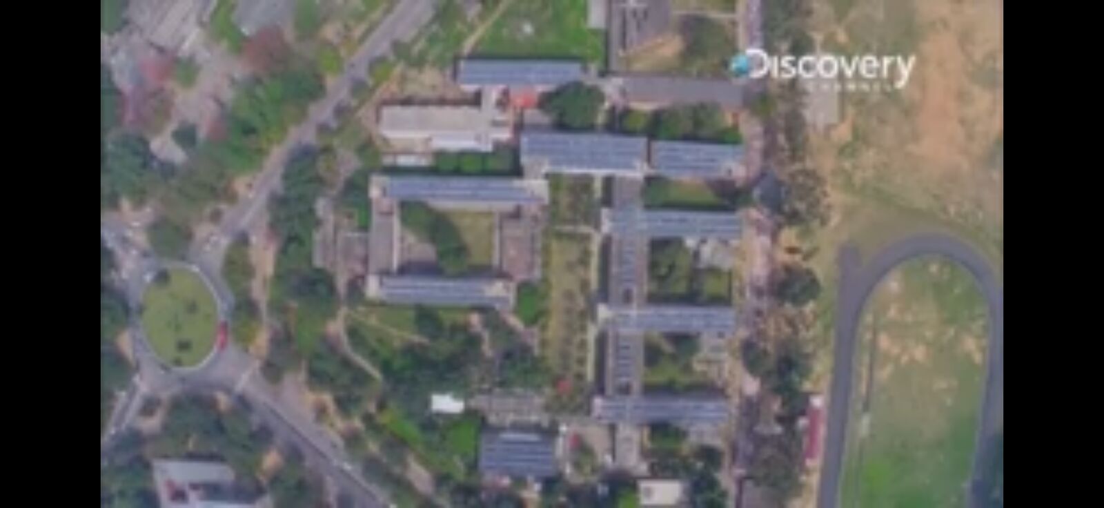 Aerial view of an institutional campus with rooftop solar — Su-Kam delivered India's first 1 MW solar project at Punjab Engineering College, Chandigarh.