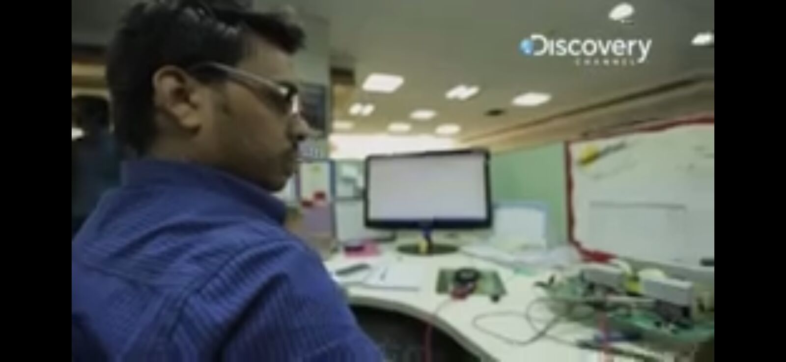 A Su-Kam R&D engineer at work at his desk — engineering depth was the foundation Su-Kam brought to MW solar.