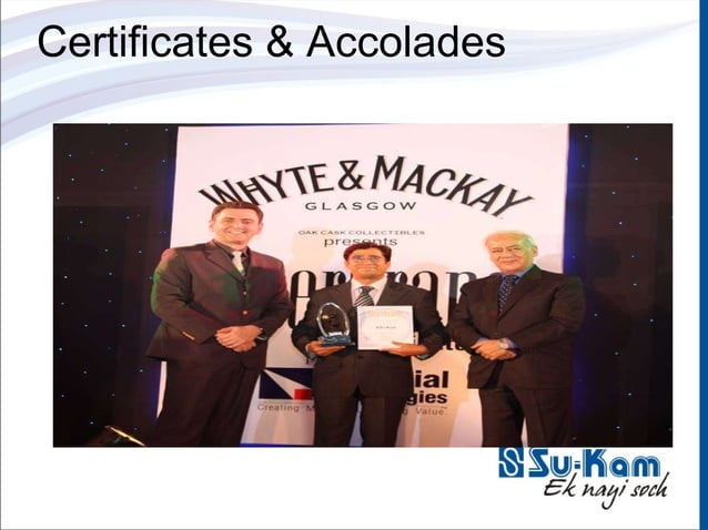 Kunwer Sachdev on stage at the Whyte and Mackay Glasgow entrepreneur ceremony receiving an international entrepreneur honour from Oak Cask Collectibles